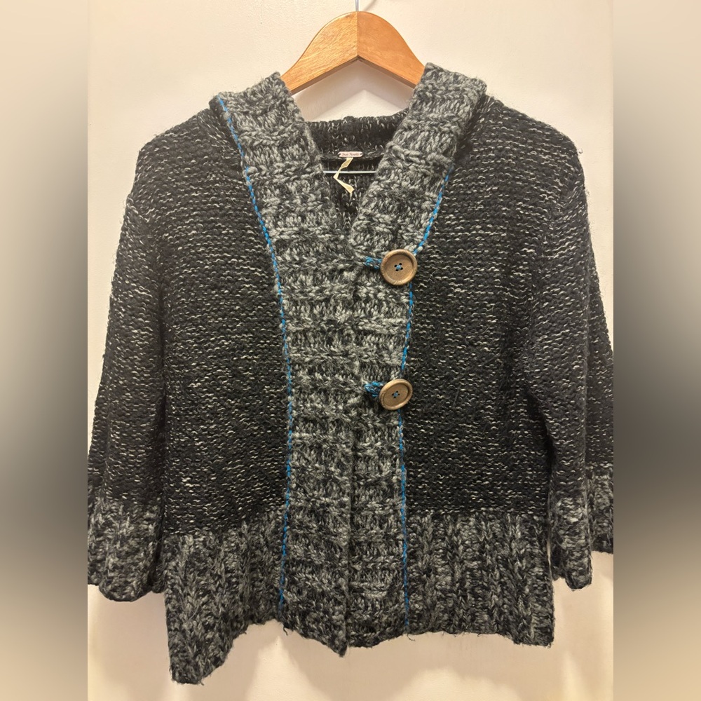 Free People hooded two button black/gray with blue stripe sweater.
